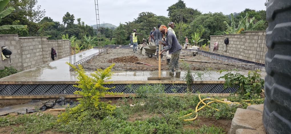 Image of a construction site with main working on foundation